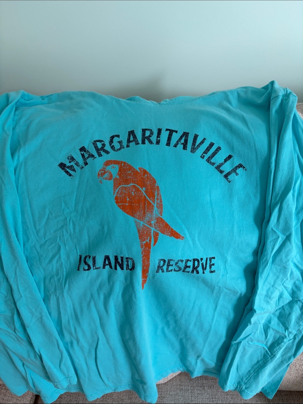 Margaritaville Turquoise Long Sleeve Hooded Tee with Orange Parrot Graphic